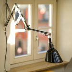 Verstelbare dubbelkopse zwenkarm wandlamp